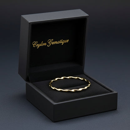 14K Yellow Twisted Bangle