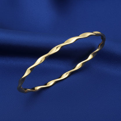 14K Yellow Twisted Bangle