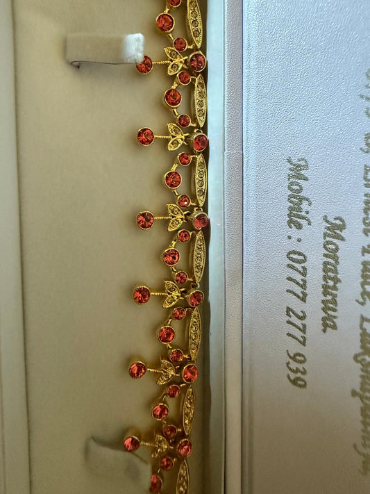 CJ15 Gold bracelet with orange stones